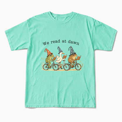 We Read at Dawn T Shirts